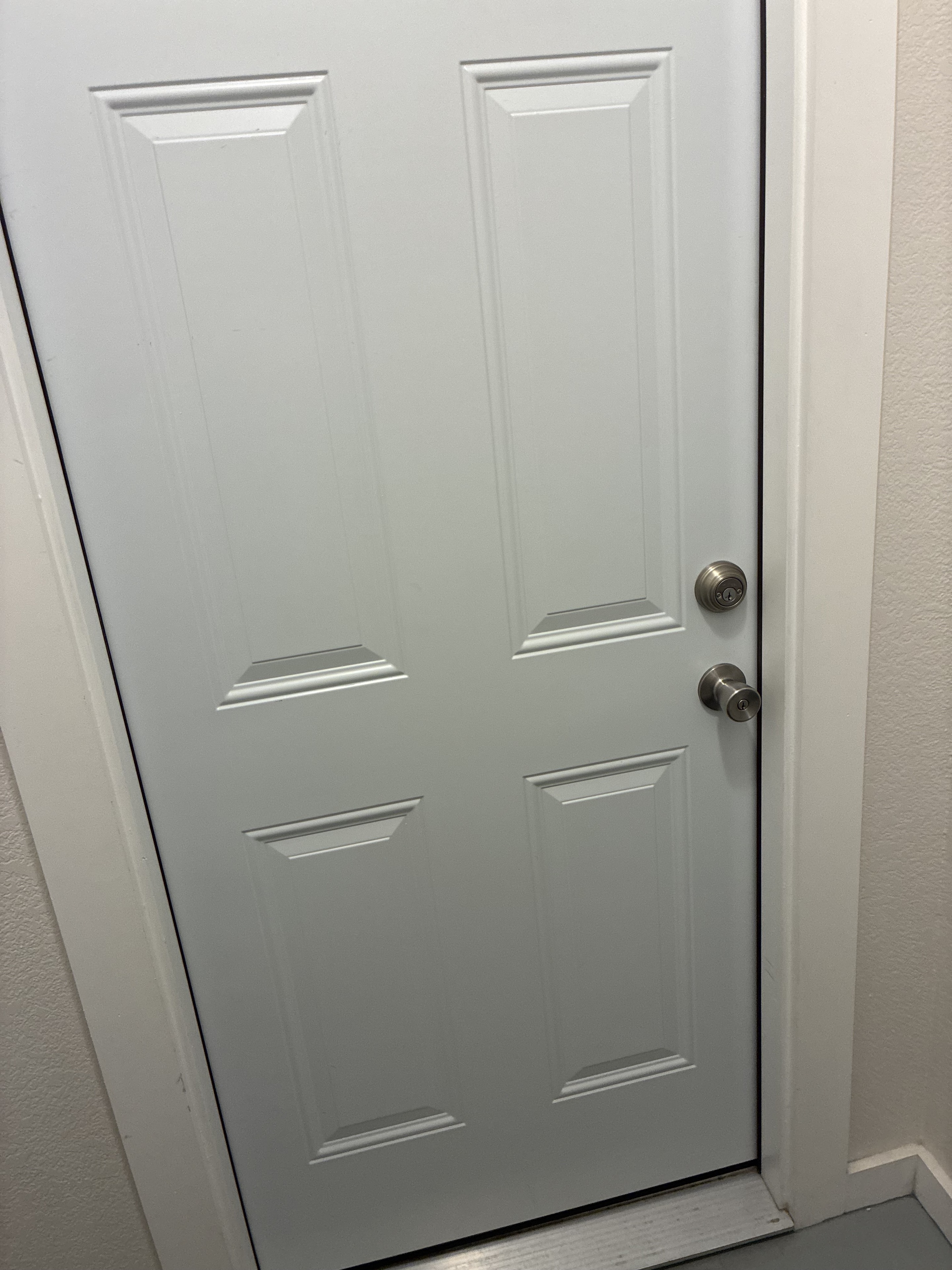 Clean door, trim, threshold, and wall area