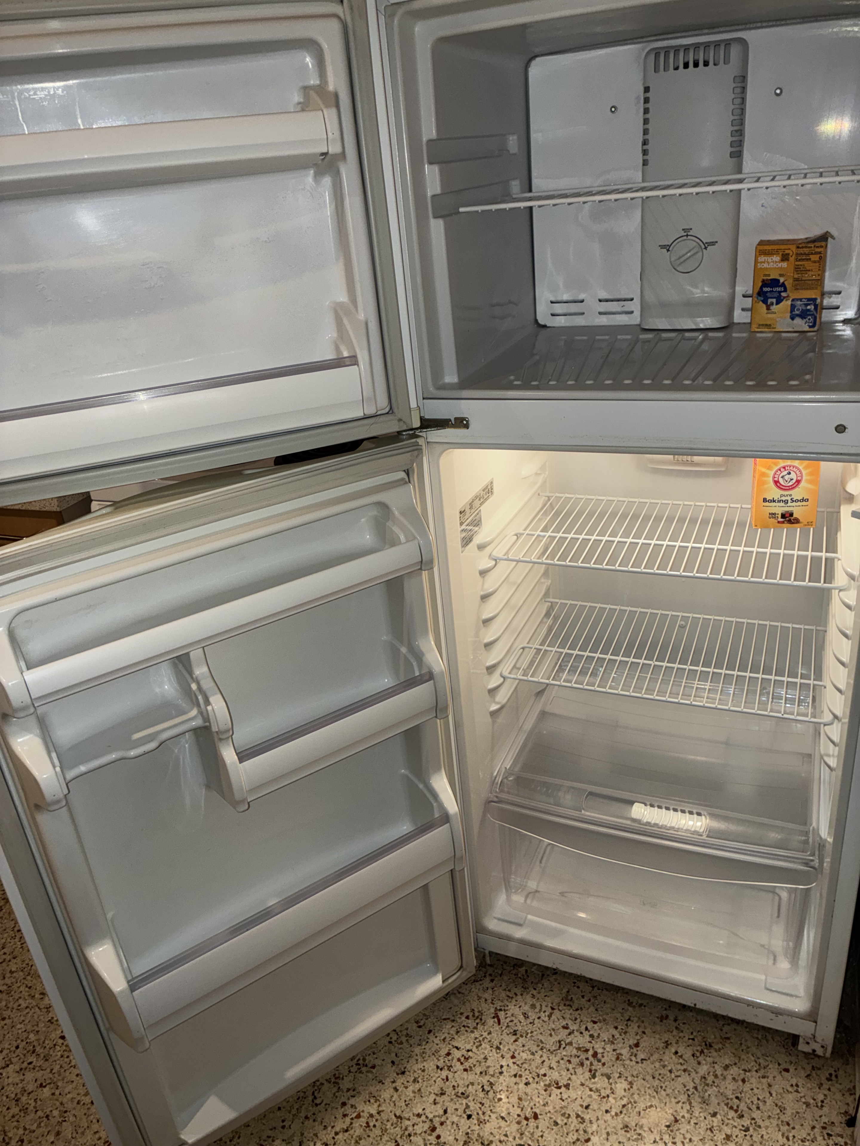 Clean empty refrigerator and freezer interior