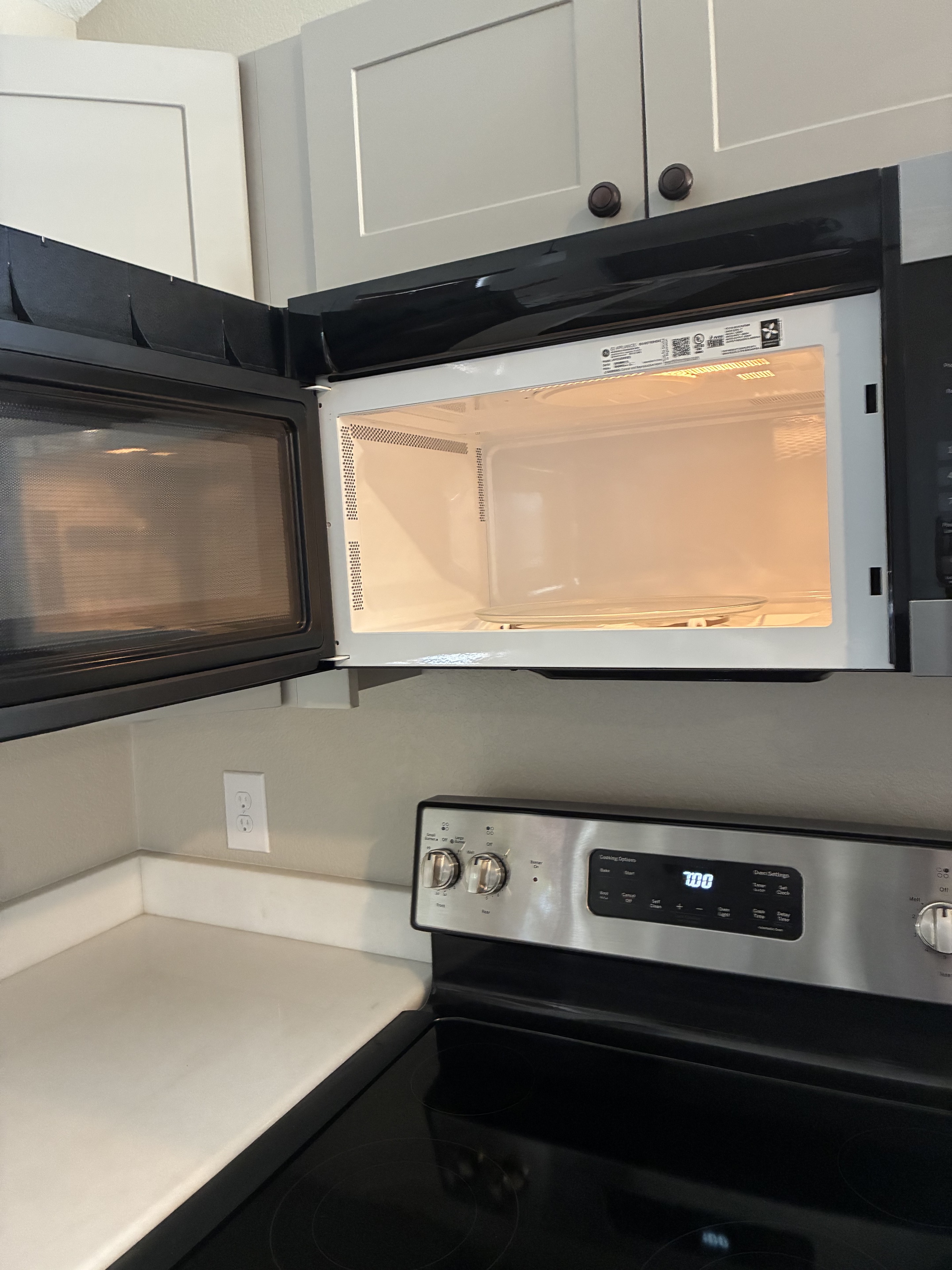 Clean microwave interior and stovetop area
