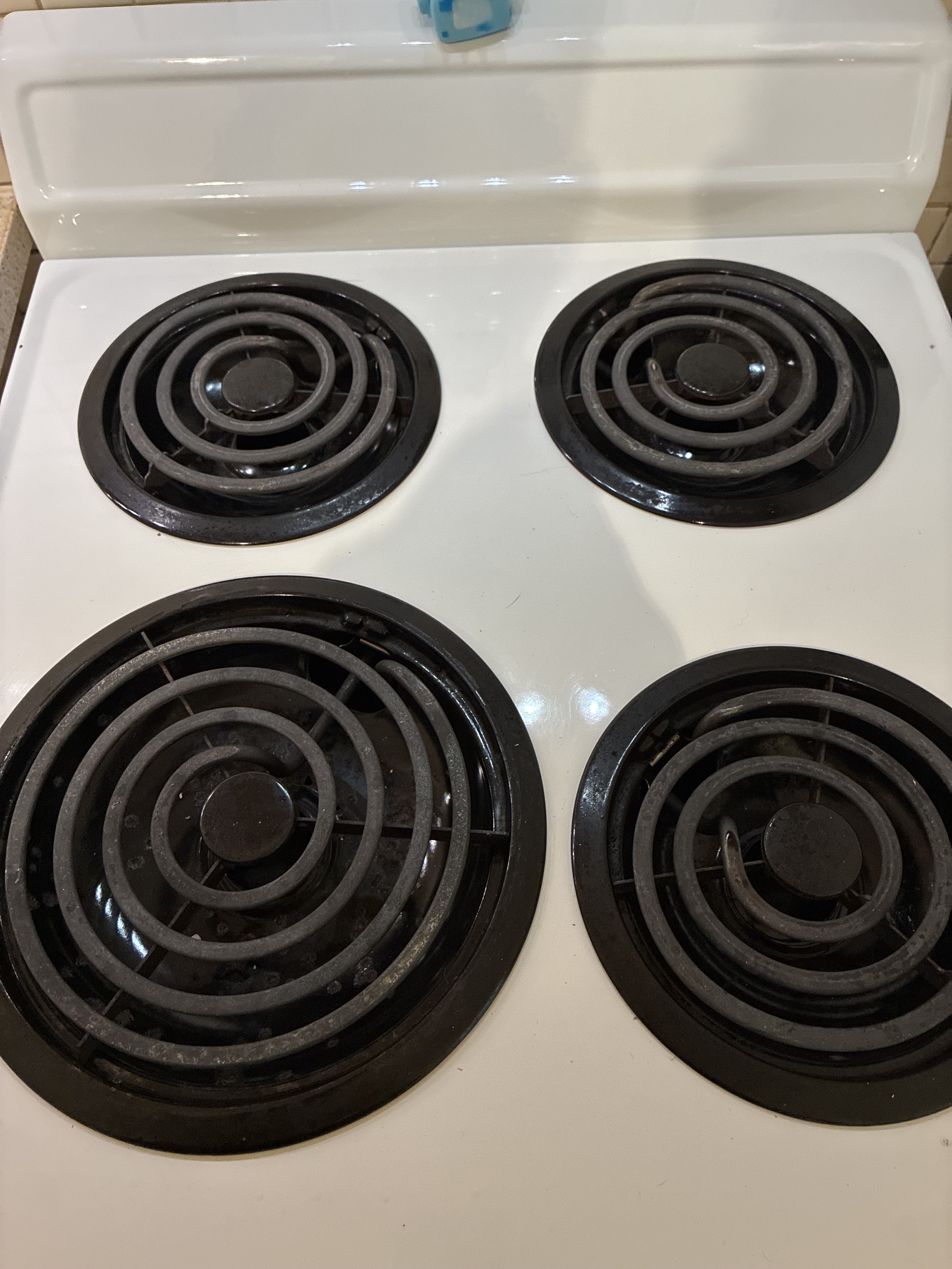 Clean electric stovetop with coil burners